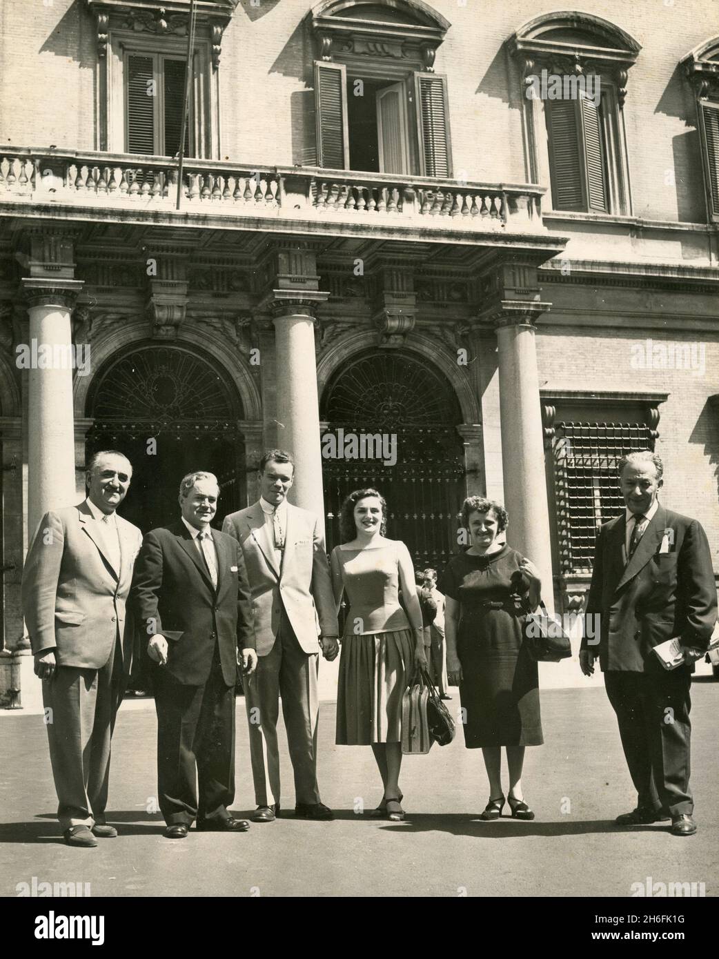 US Ambassador Clare Boothe Luce (second from right) with Italian shoemaker Gino Prato and his family, Rome, Italy 1955 Stock Photo