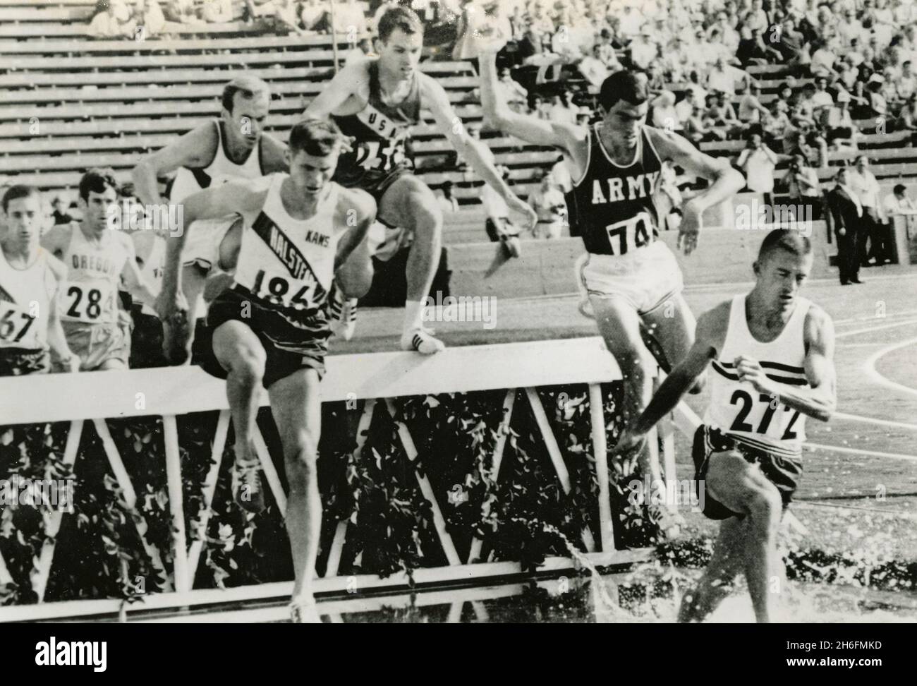 American athlete Young leading the 3,000meter steeplechase race