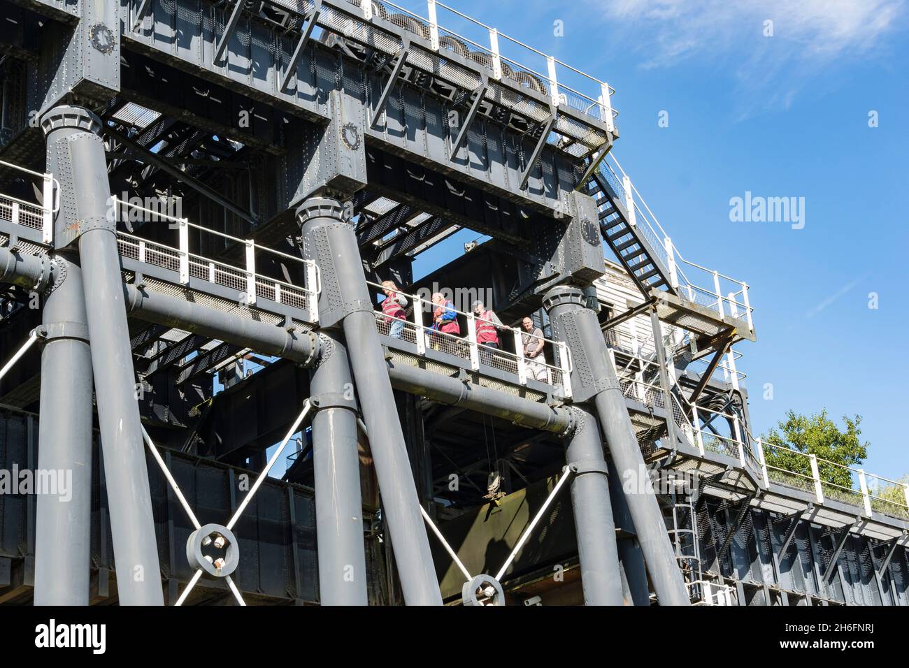 Visitors being shown around Anderton Boat Lift Northwich Cheshire 2021 Stock Photo