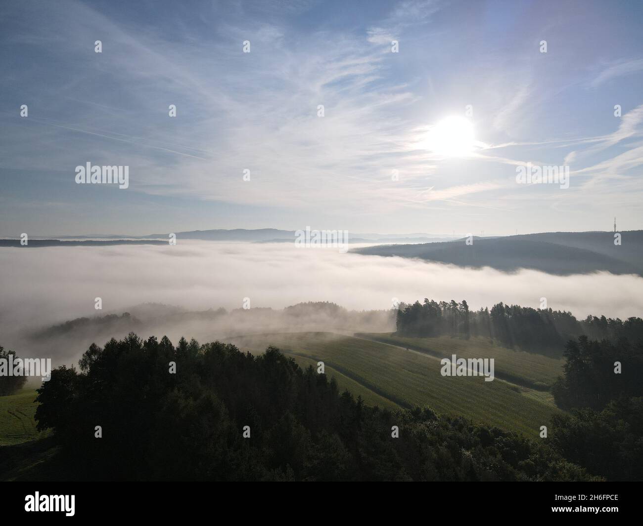 Beautiful shot of a town under the foggy and cloudy skies Stock Photo ...