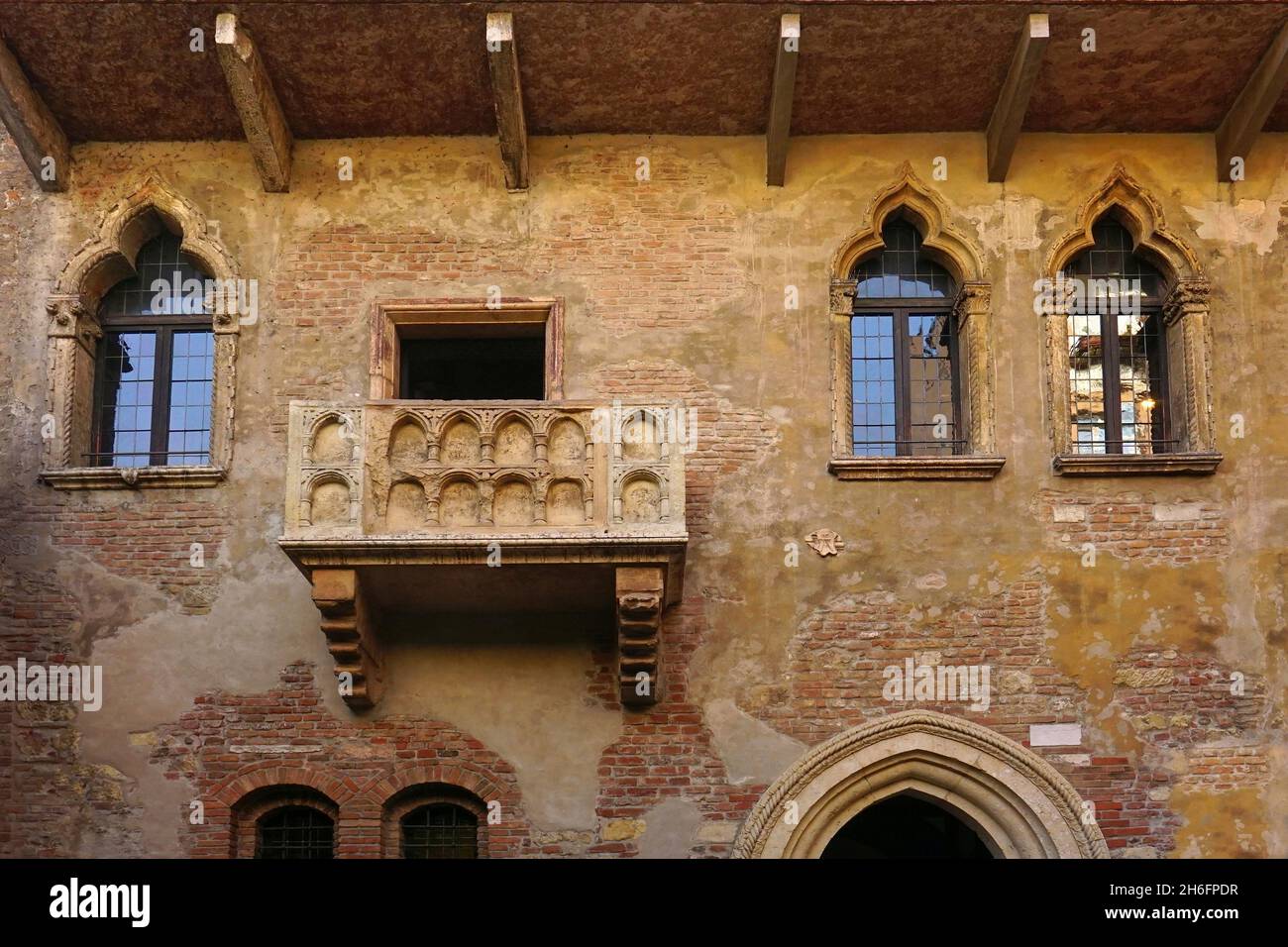 Gothic-style 13th century house with a stone balcony which have inspired Shakespeare. Verona, Italy Stock Photo