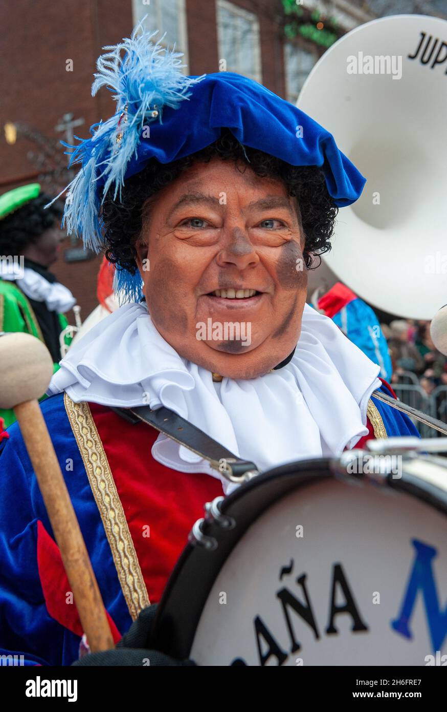 ENSCHEDE, THE NETHERLANDS - NOV 13, 2021: Black Pete is the helping hand of the Dutch Sinterklaas. Nowadays he is not completely black anymore. Stock Photo