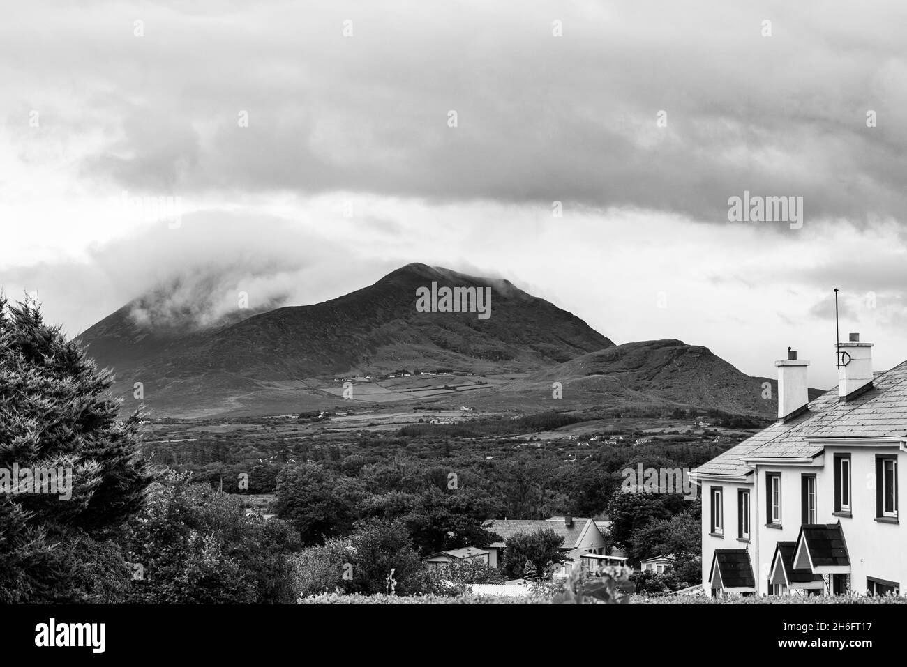 Croagh Patrick mountain covered in cloud as seen from Louisburgh Old Head in County Mayo, Ireland Stock Photo