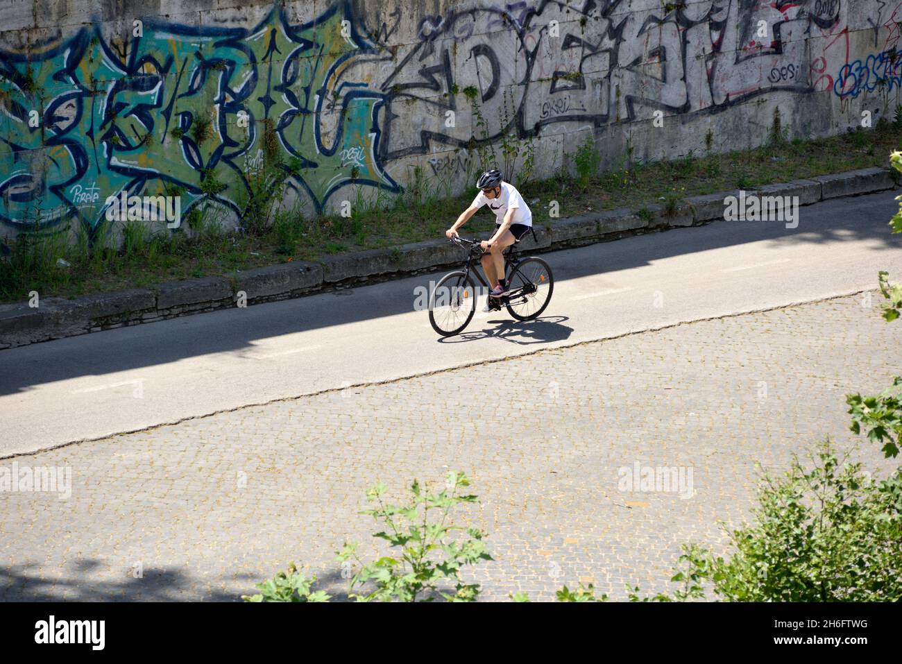 Cycling along the Tiber river, Rome, Italy Stock Photo