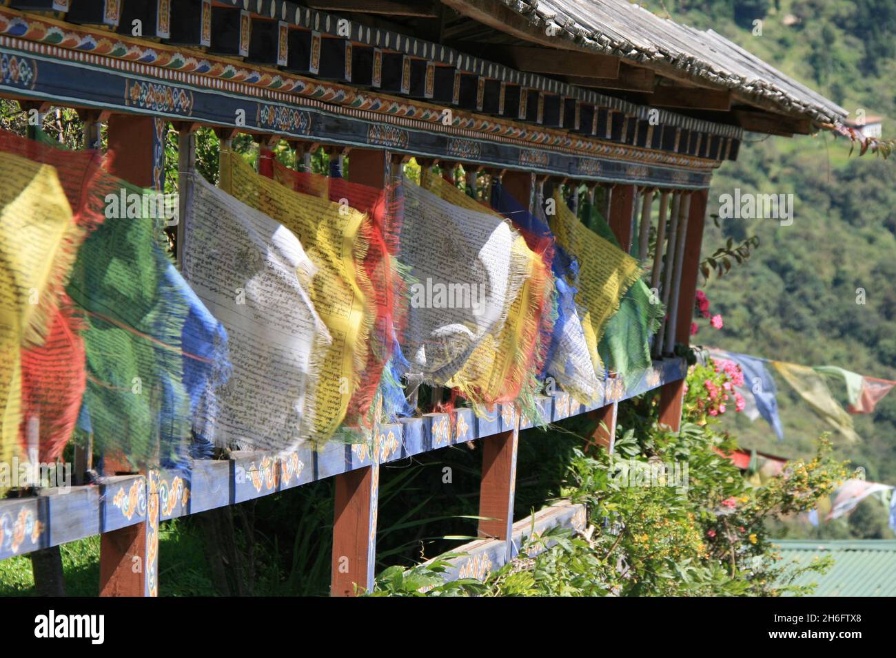 buddhist prayer flags in bhutan Stock Photo - Alamy
