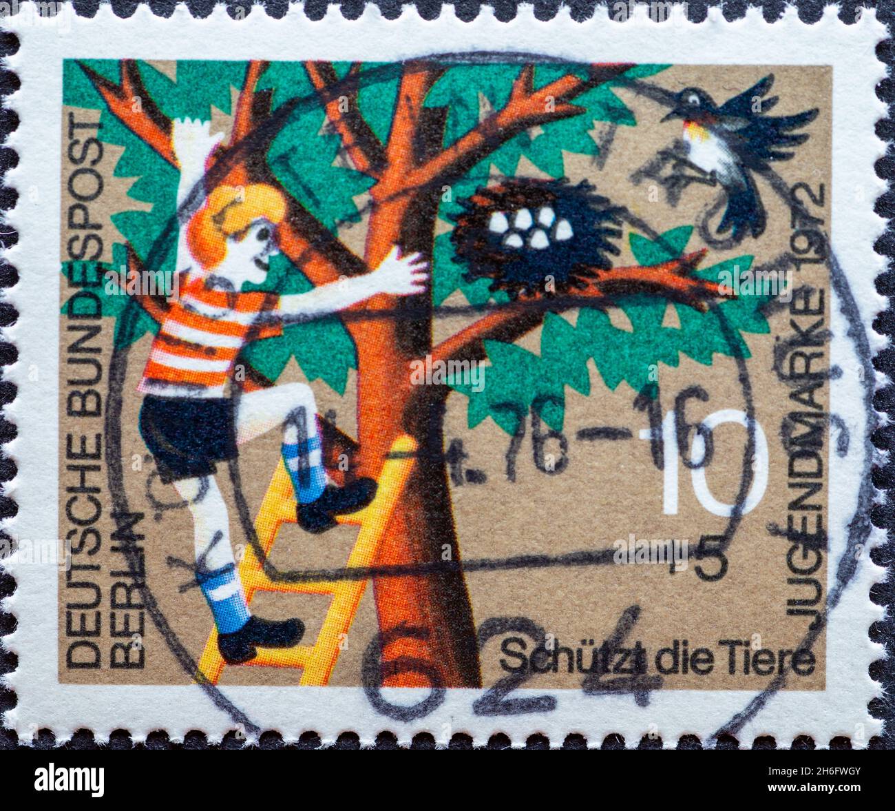 GERMANY, Berlin - CIRCA 1972: a postage stamp from Germany, Berlin showing a charity postal stamp from 1972 for young people and animal welfare Here: Stock Photo