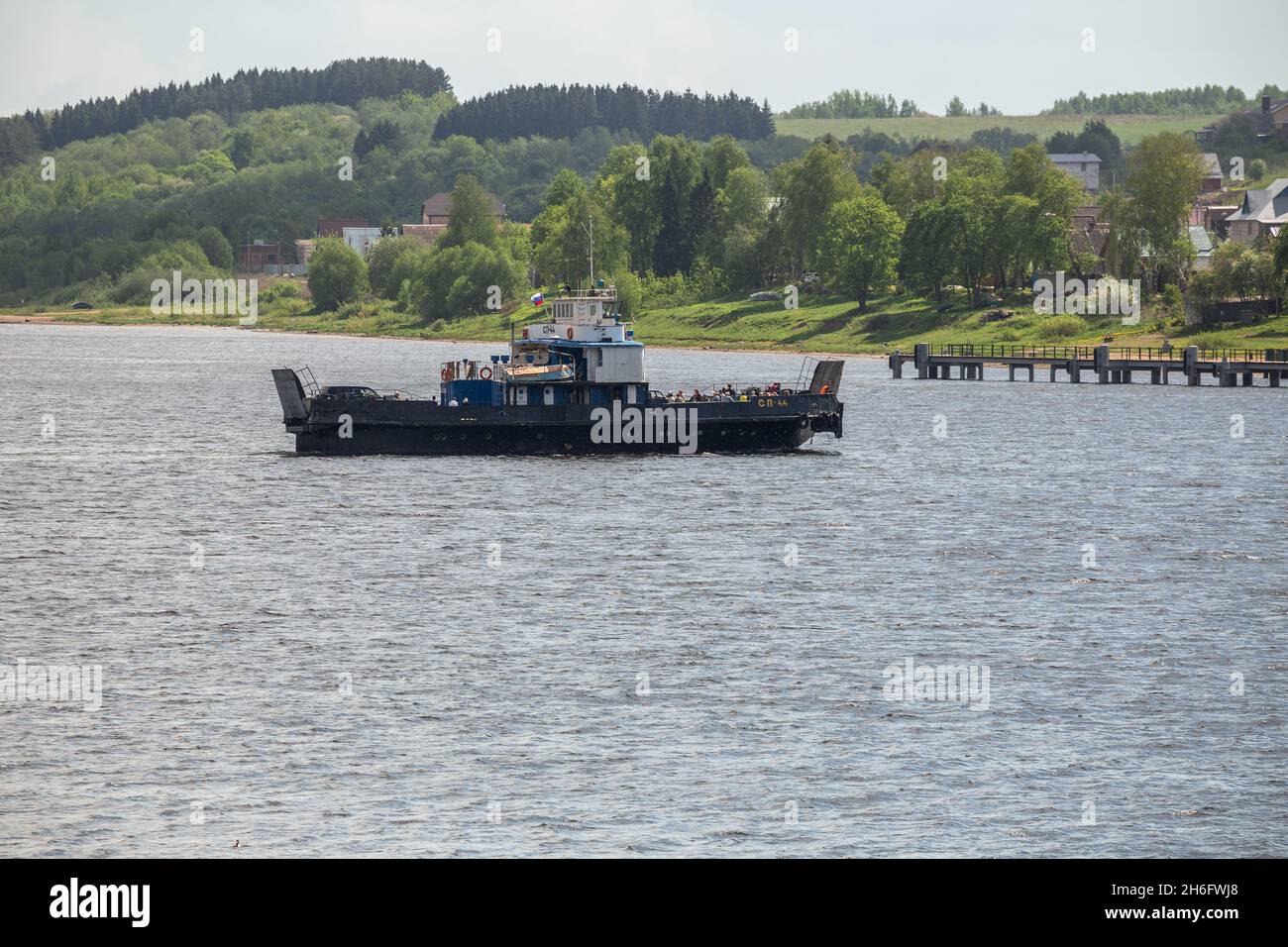 Tutaev, Yaroslavl region, Russia - May 15, 2019: Ferry crossing the Volga river. Car ferry SP44 transports cars and passengers from one bank of the Vo Stock Photo