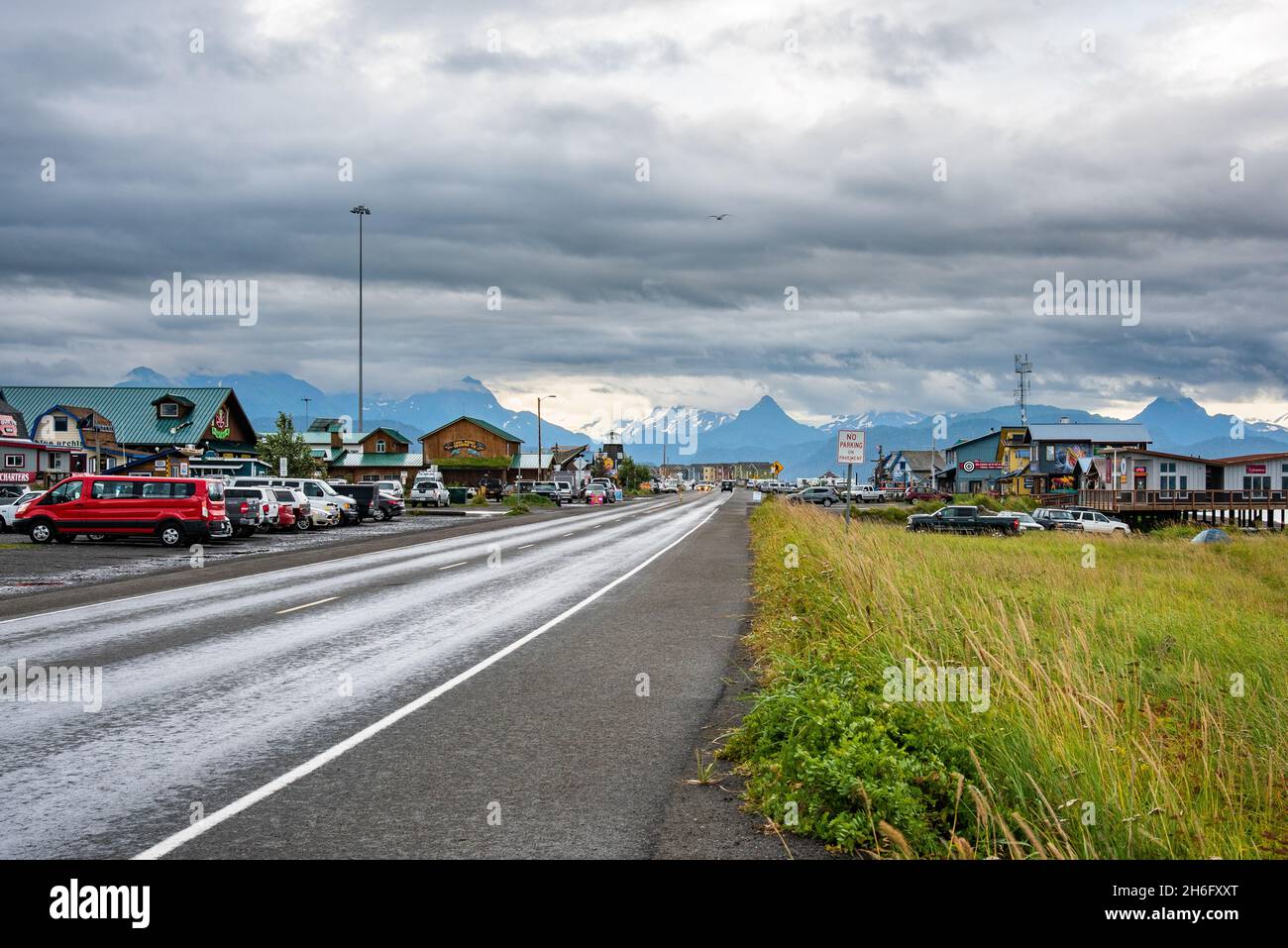 Homer Spit, Alaska, USA - August 07, 2018: View of the main street of Homer Spit. A tourist shopping area with gift shops and restaurants. Stock Photo