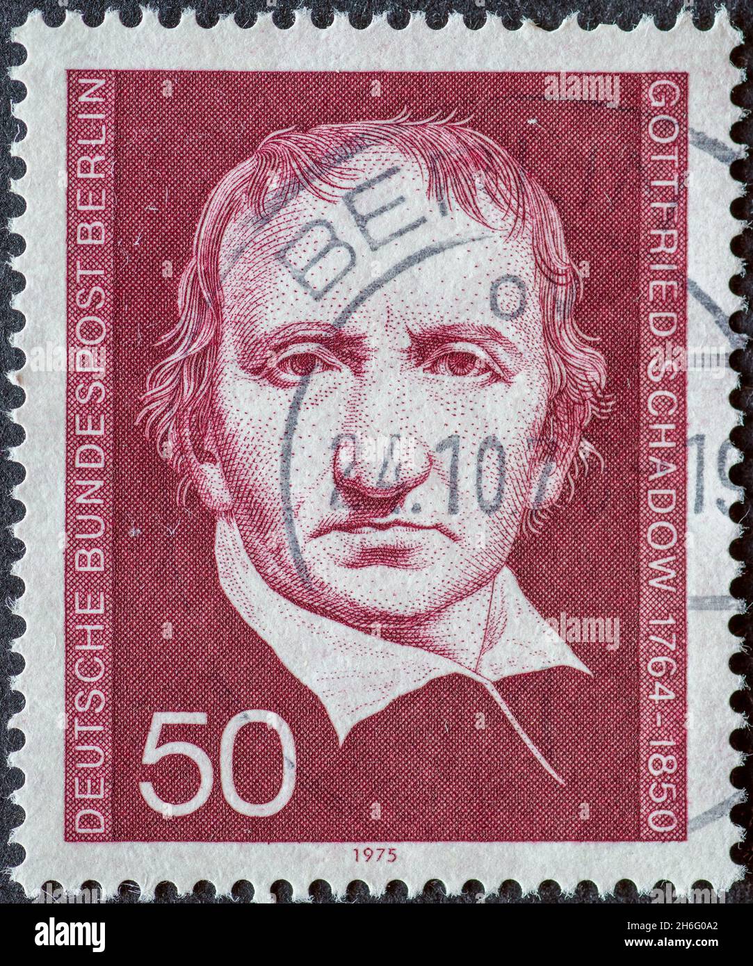 GERMANY, Berlin - CIRCA 1975: a postage stamp from Germany, Berlin showing a portrait of the graphic artist and sculptor of classicism gottfried Schad Stock Photo