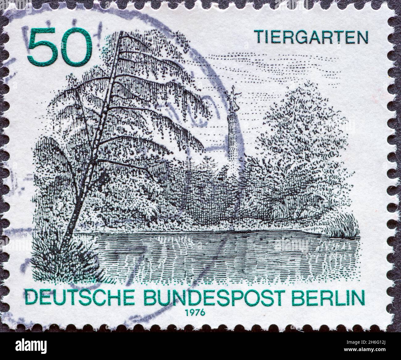 GERMANY, Berlin - CIRCA 1976: a postage stamp from Germany, Berlin showing a Berlin view:  Trees and lake in the zoo with victory column Stock Photo