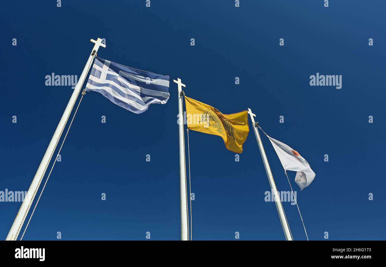 Symbols of Cyprus. Three flags - Greek, Church and Cypriot. Stock Photo