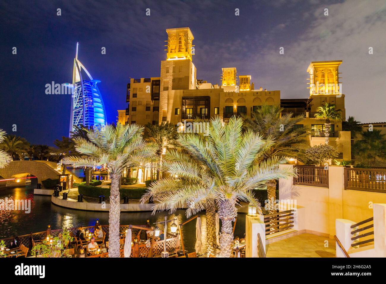 DUBAI, UAE - MARCH 11, 2017: Night view of Burj Al Arab Tower of the Arabs seen from Madinat Jumeirah in Dubai, United Arab Emirates Stock Photo