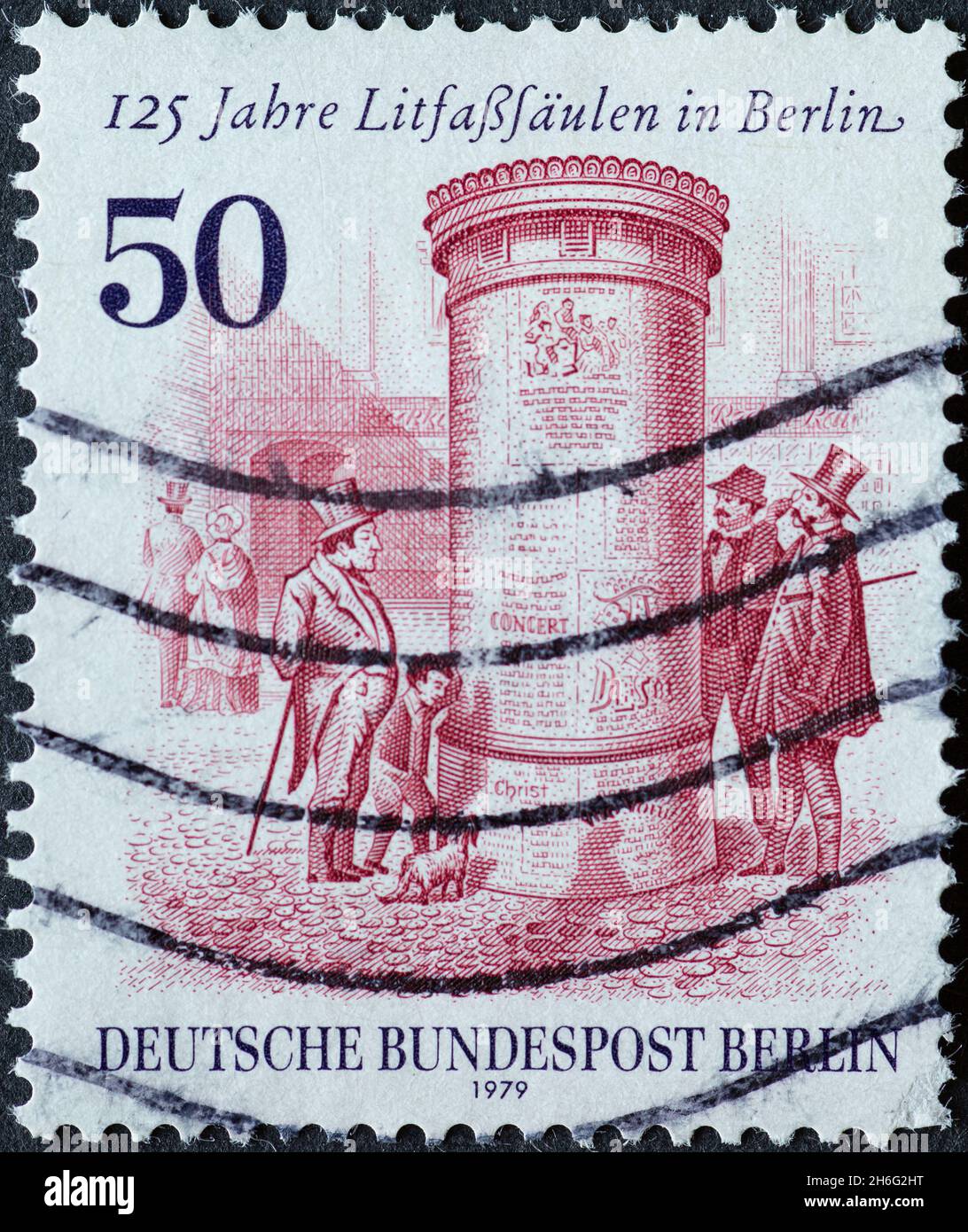 GERMANY, Berlin - CIRCA 1980: a postage stamp from Germany, Berlin showing a historical advertising column with audience. Text: 125 years of advertisi Stock Photo