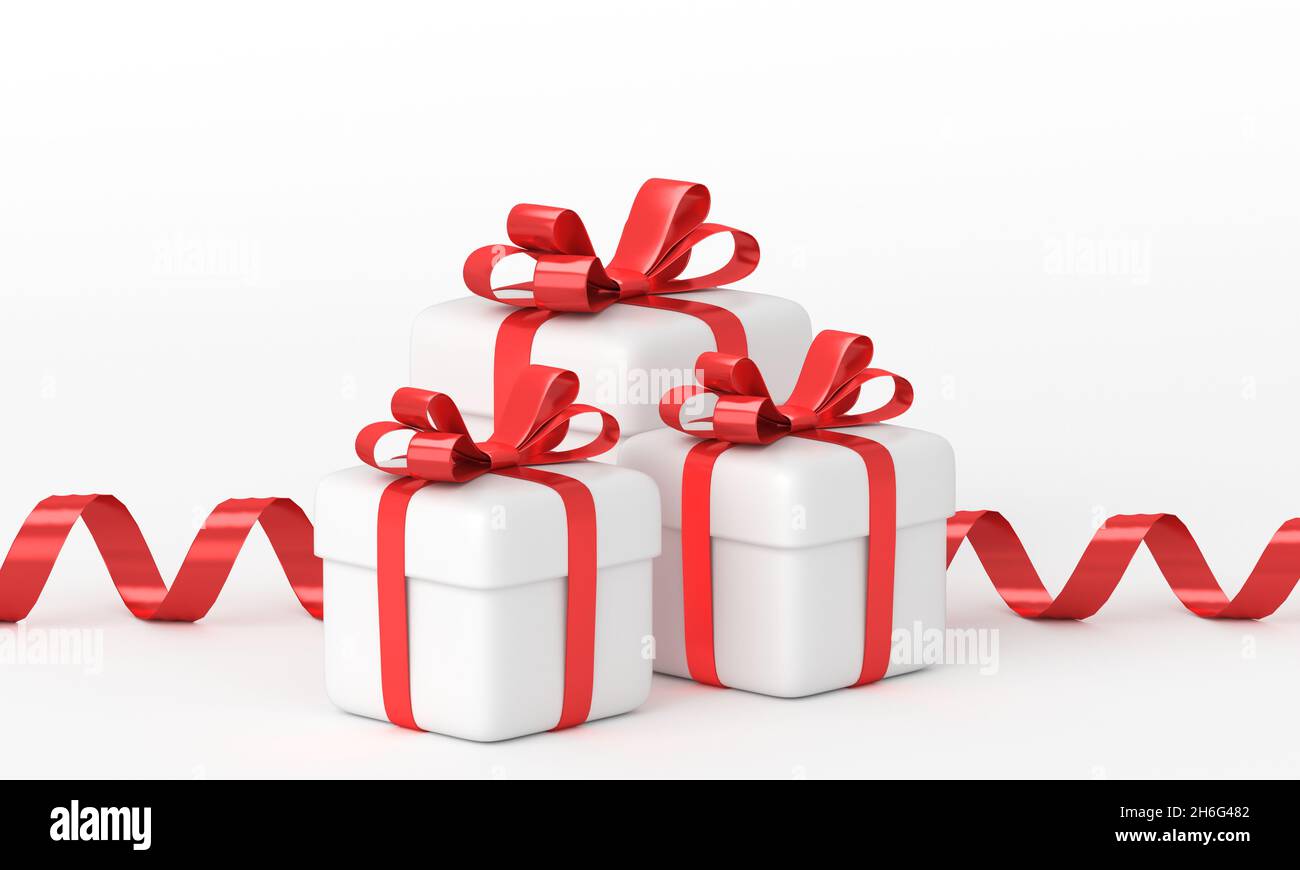 Three christmas gifts with ribbons and bows on the white background. 3d rendering Stock Photo