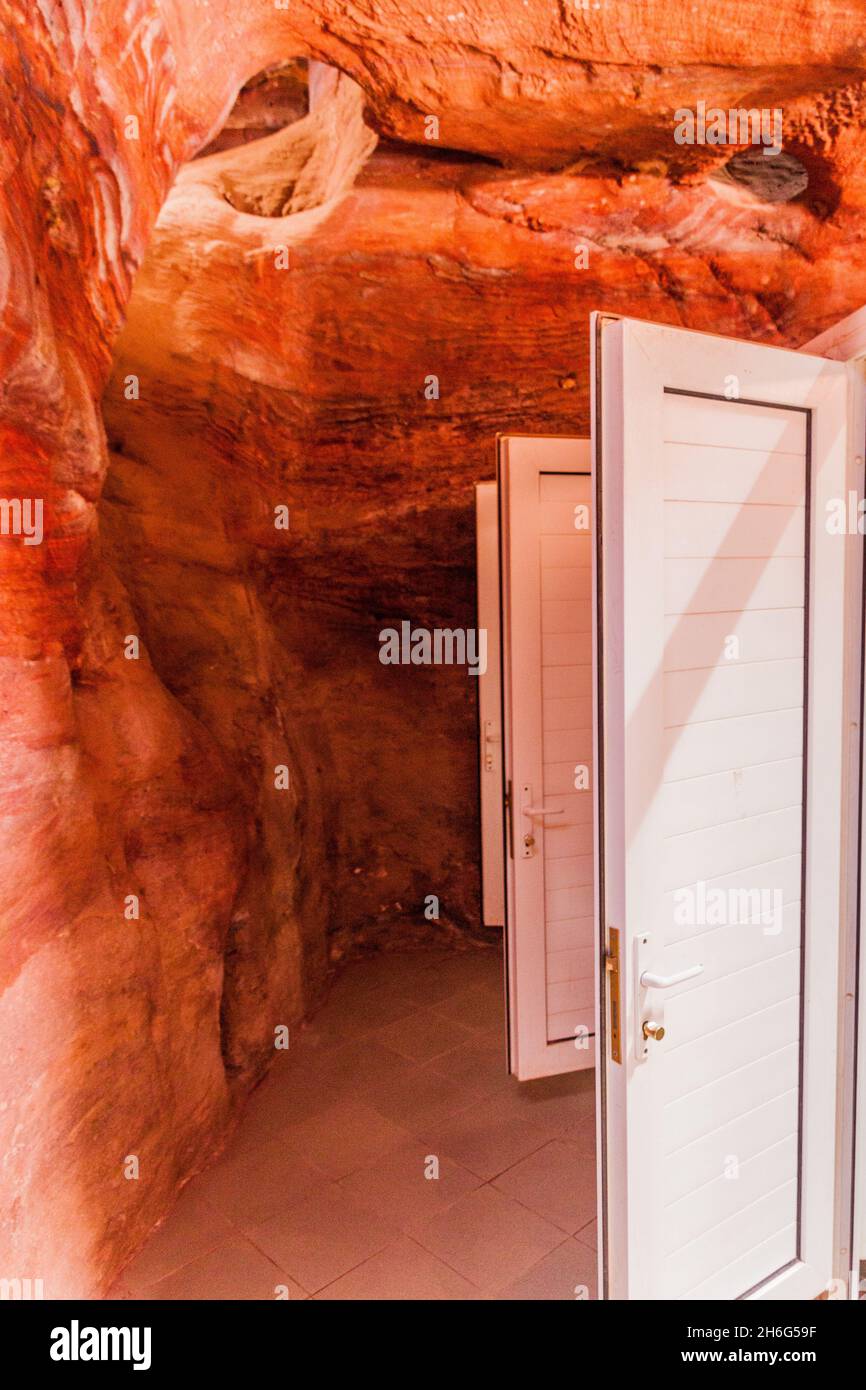 Cave public bathroom in the ancient city Petra, Jordan Stock Photo