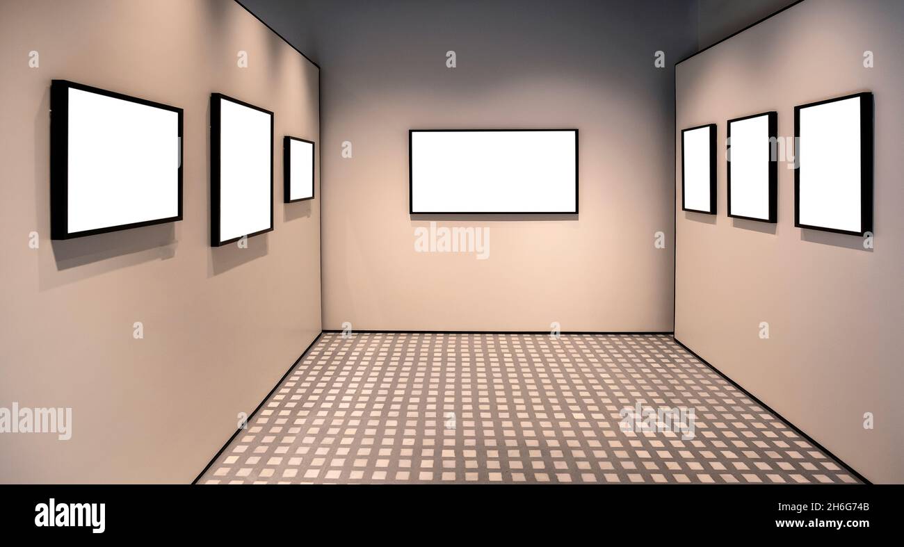 black frames on isolated walls inside empty room Stock Photo