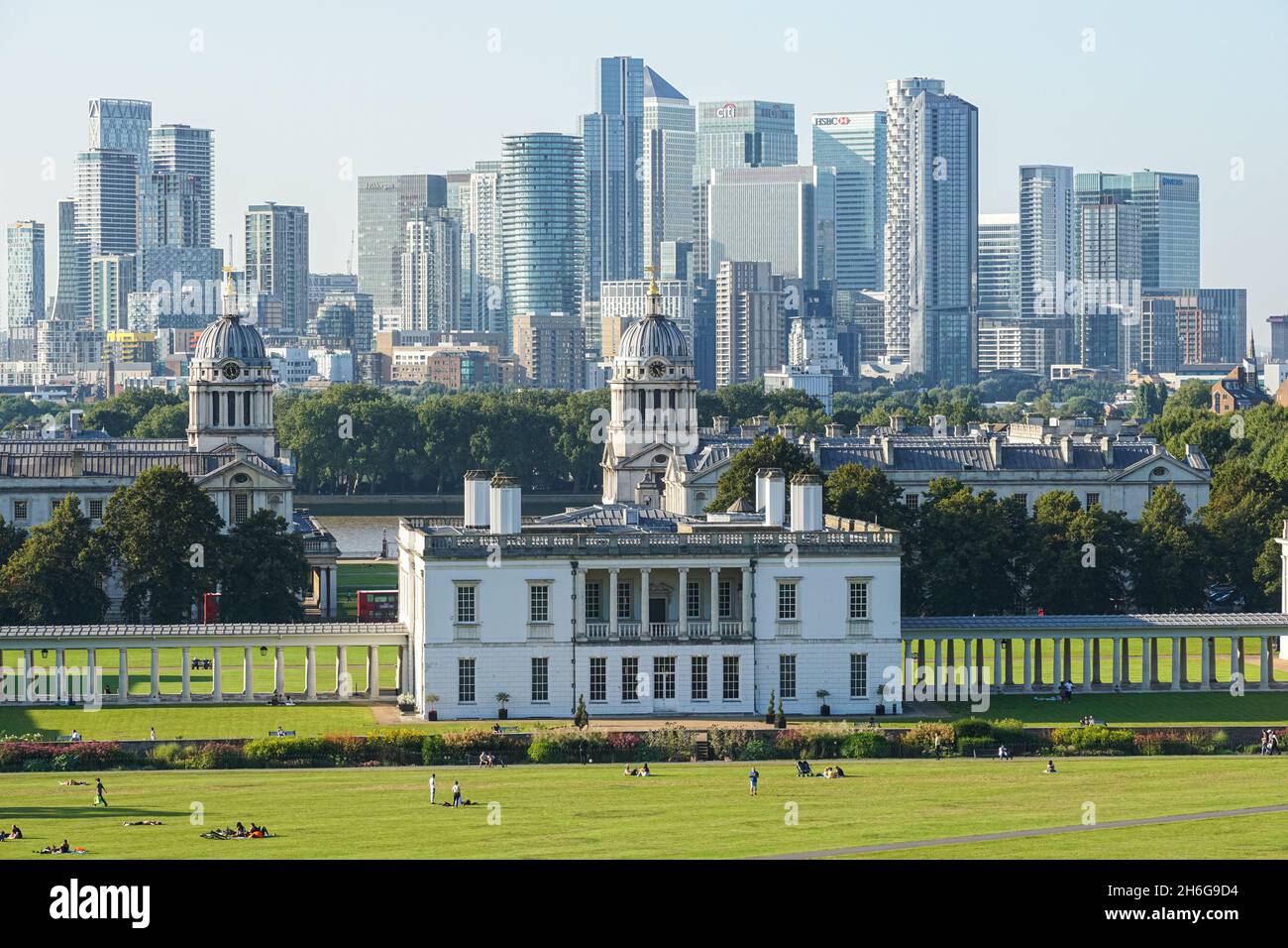 View of Canary Wharf skyscrapers from Greenwich Park with Queen's House building in the foreground, London, England, United Kingdom, UK Stock Photo
