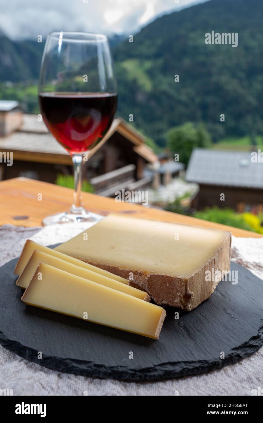 Cheese collection, French cow cheese comte, beaufort, abondance, red