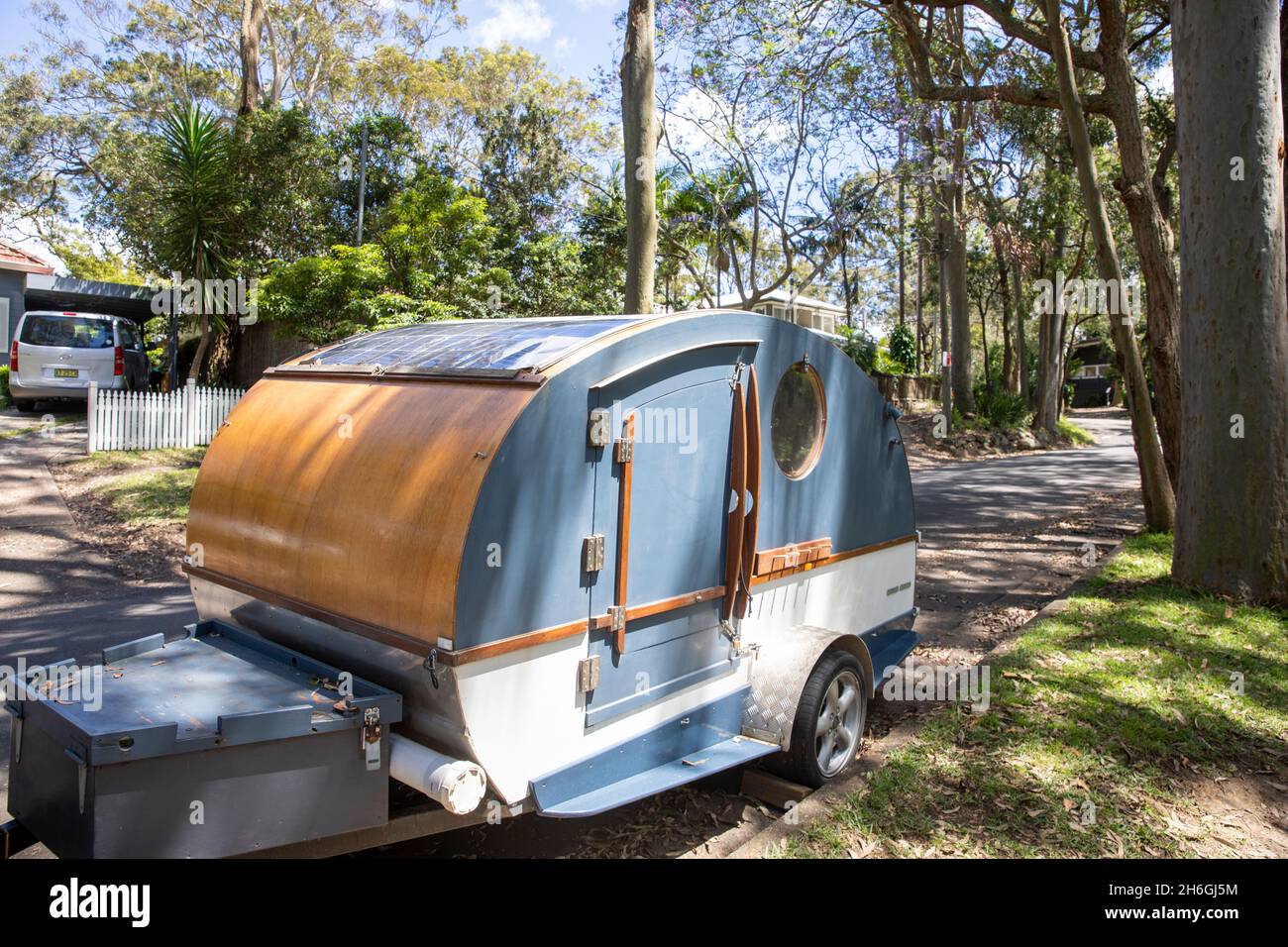 Australia home made as a student project wooden camper trailer on wheels parked in a Sydney street,Australia Stock Photo