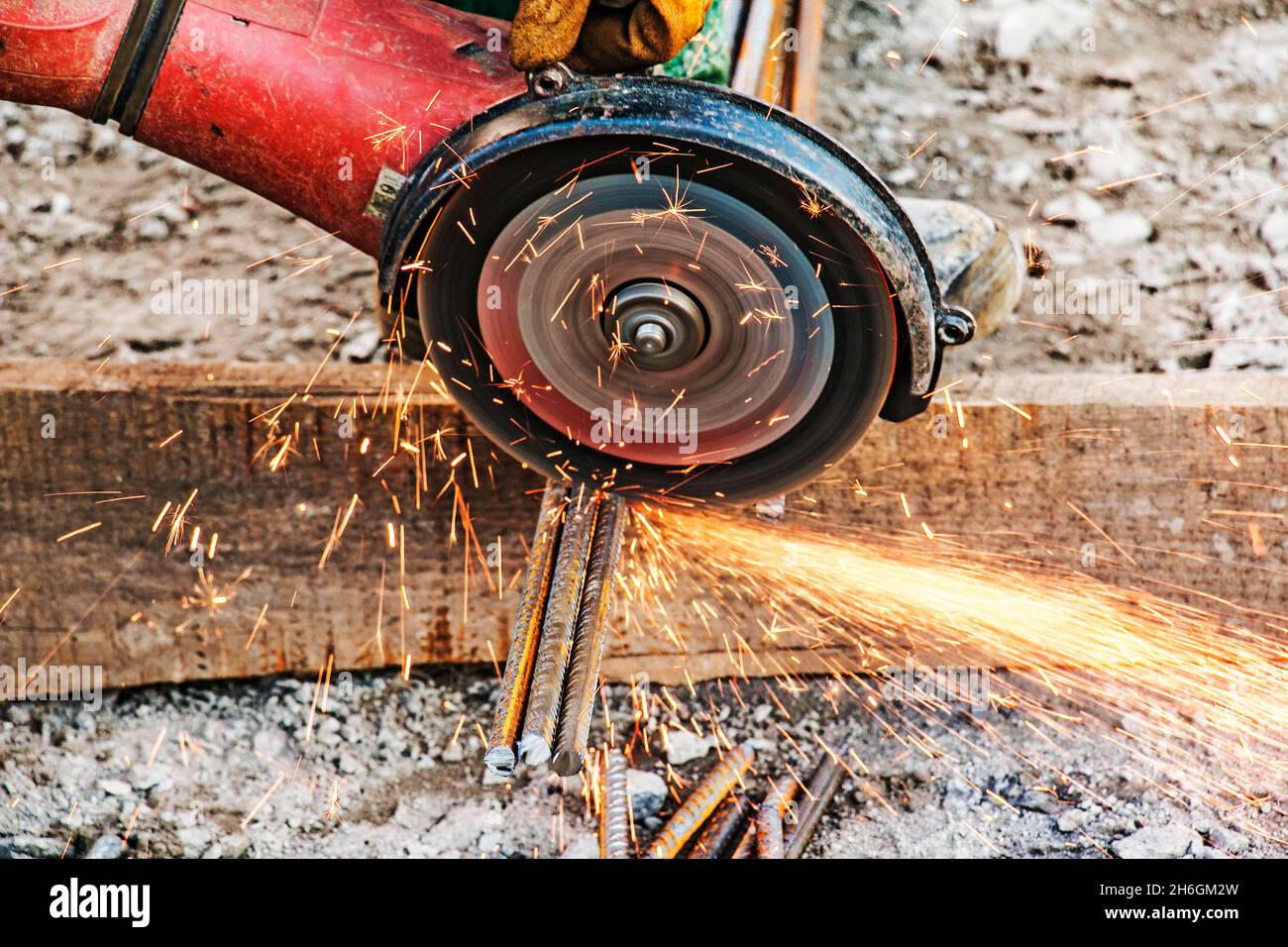 angle grinder cutting rebar construction site