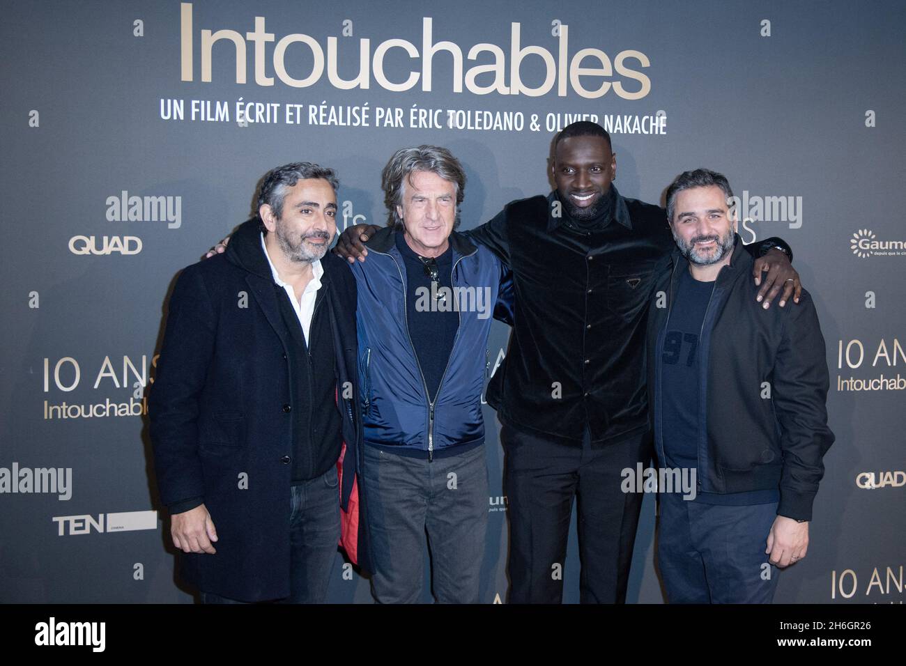 Eric Toledano, Francois Cluzet, Omar Sy and Olivier Nakache attending the 10th Anniversary of the Film Intouchables at the UGC Normandie cinema in Paris, France on November 15, 2021. Photo by Aurore Marechal/ABACAPRESS.COM Stock Photo