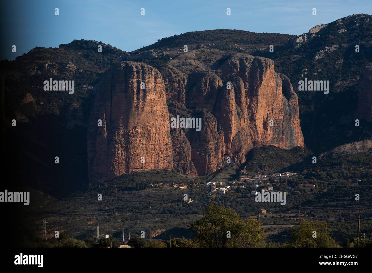 Landscape of Los Mallos de Riglos, or Mallets of Riglos, a huge conglomerate of rock formations, in the Hoya de Huesca region, Aragon, Spain Stock Photo
