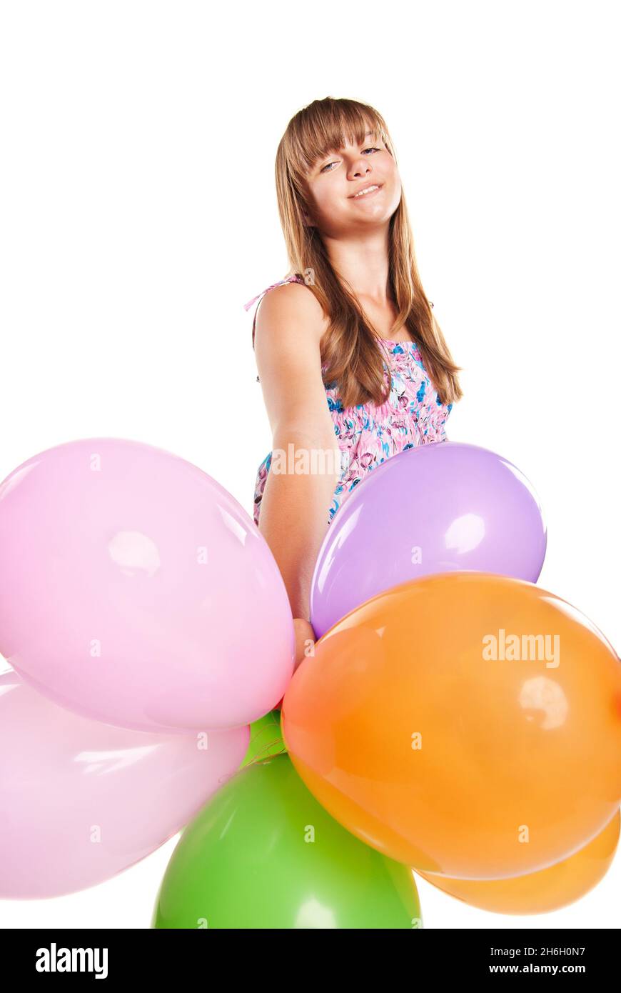 Teenage girl playing with balloons Stock Photo Alamy