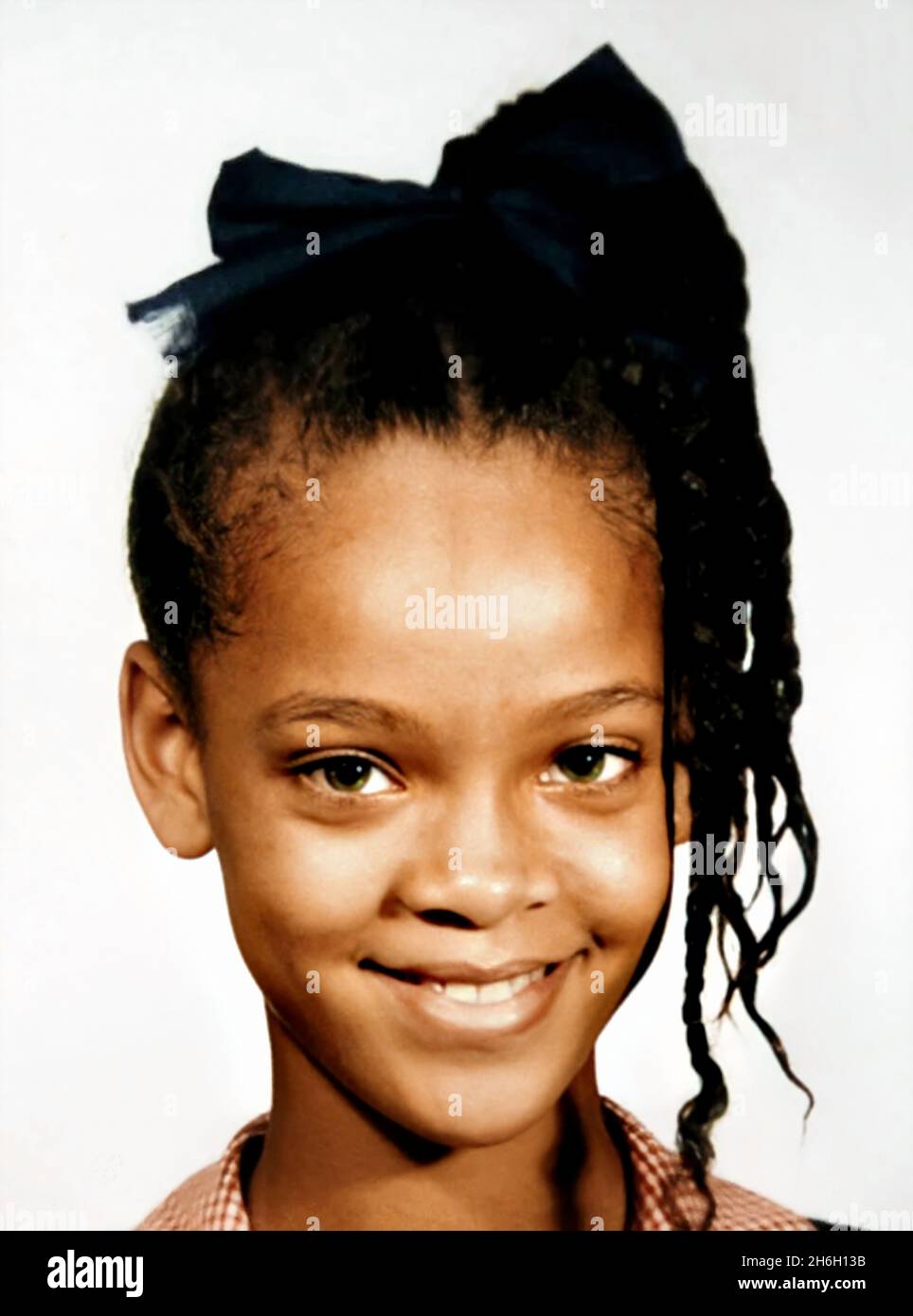 1999 , USA : The celebrated american singer RIHANNA ( Robyn Rihanna Fenty , born 20 february 1988 ), when was a young girl aged 11 . Unknown photographer. - HISTORY - FOTO STORICHE - personalità da giovane giovani - ragazza - personality personalities when was young girl - INFANZIA - CHILDHOOD - POP MUSIC - MUSICA - cantante - bambino - BAMBINI - BAMBINA - CHILD - CHILDREN - BAMBINO - CHILDHOOD - INFANZIA - smile - sorriso --- ARCHIVIO GBB Stock Photo