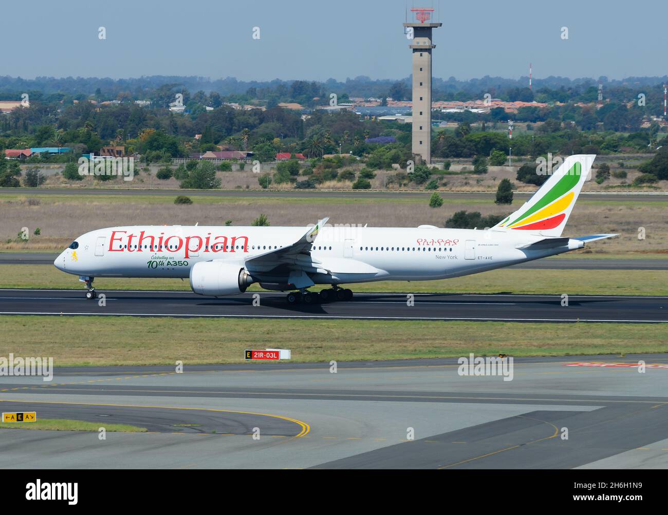 Ethiopian Airlines Airbus A350-900 airplane with special decal celebrating the 10th A350 aircraft of the airline departing Johannesburg, South Africa. Stock Photo