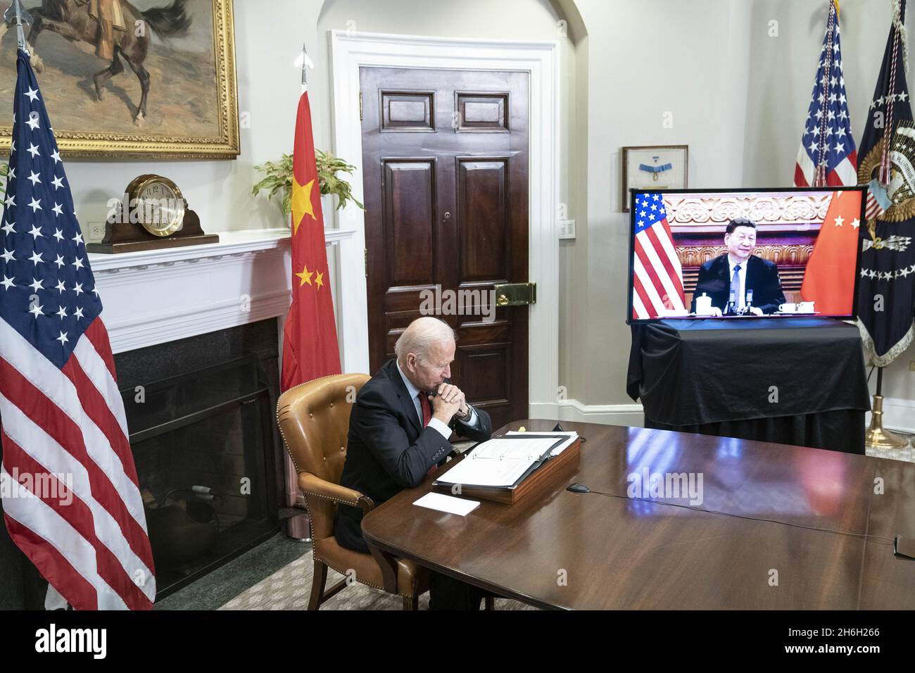 Washington, United States. 15th Nov, 2021. President Joe Biden listens during a virtual summit with Chinese President Xi Jinping in the Roosevelt Room of the White House in Washington DC on Monday, November 15, 2021. Photo by Sarah Silbiger/UPI Credit: UPI/Alamy Live News Stock Photo