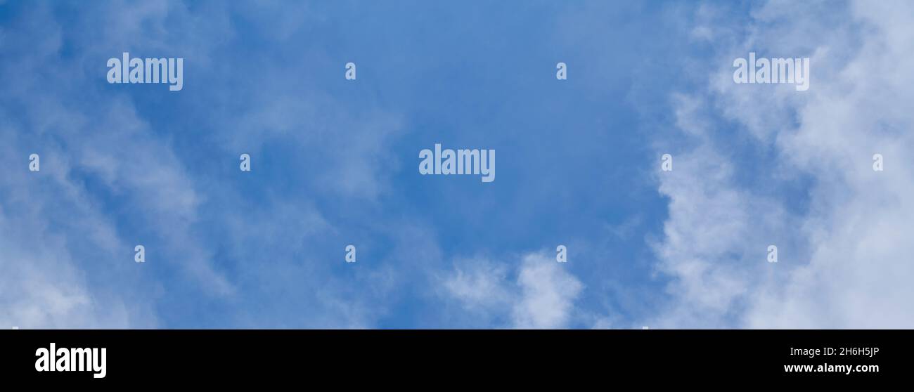 Blue sky background with white clouds. Panorama Stock Photo - Alamy