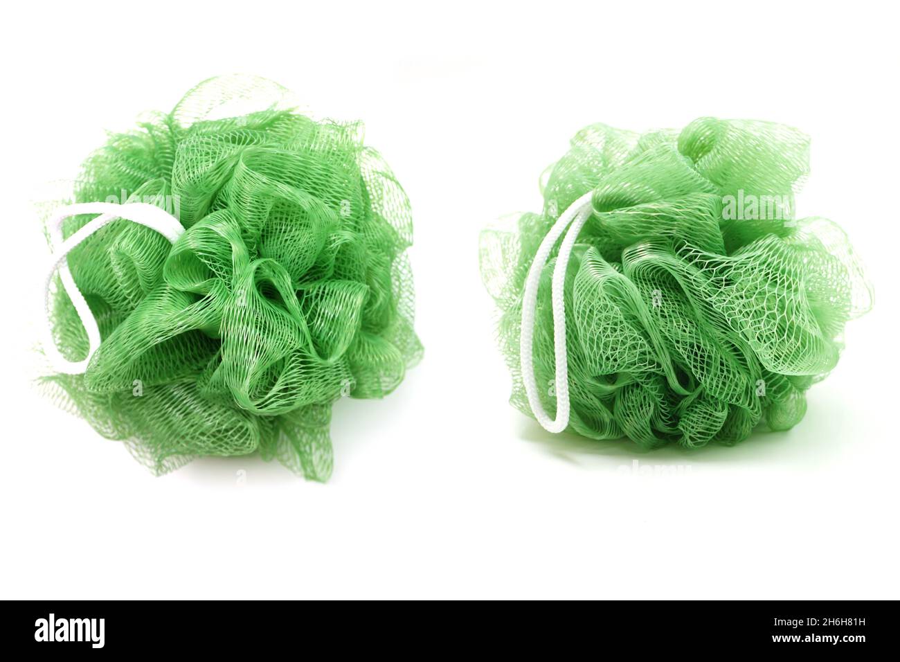 Green bath soft with rope isolated on white background Stock Photo - Alamy