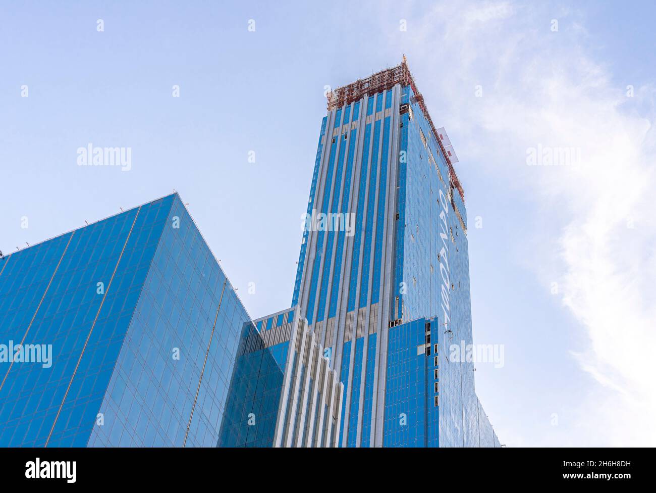 Qazaqstan, tallest building in Central Asia in a mixed-use development complex Abu-Dabi plaza in Nur-Sultan, Kazakhstan. Skyscraper under development. Stock Photo