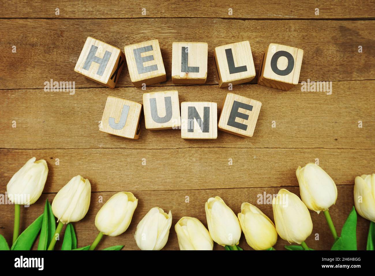 June 01 Letters Hello June alphabet letters on wooden background Stock Photo - Alamy