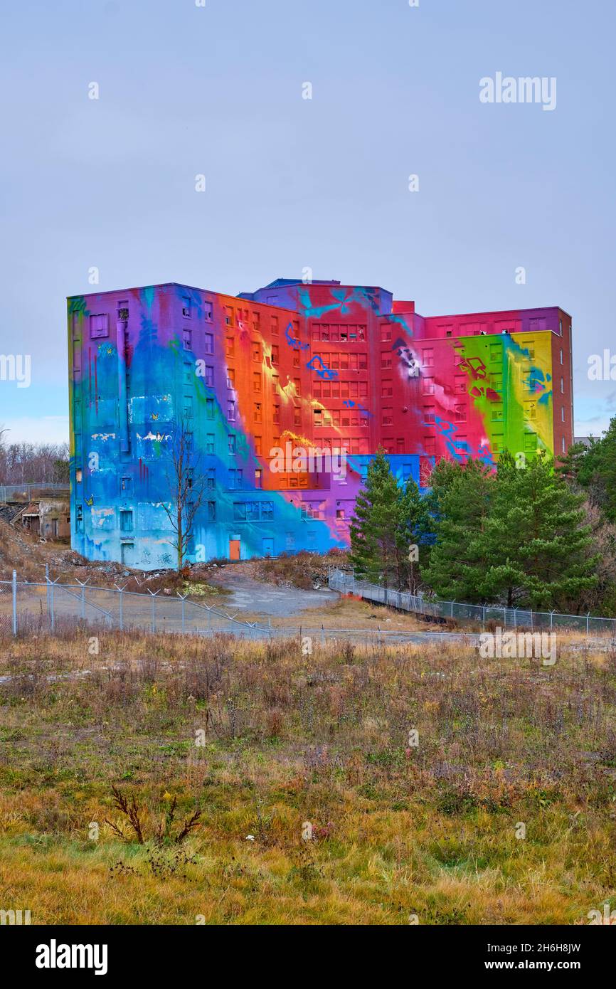 The former St Josephs Health Centre, Sudbury General Hospital, has been transformed into a giant mural of vibrant colours in hopes of uniting Canadian Stock Photo