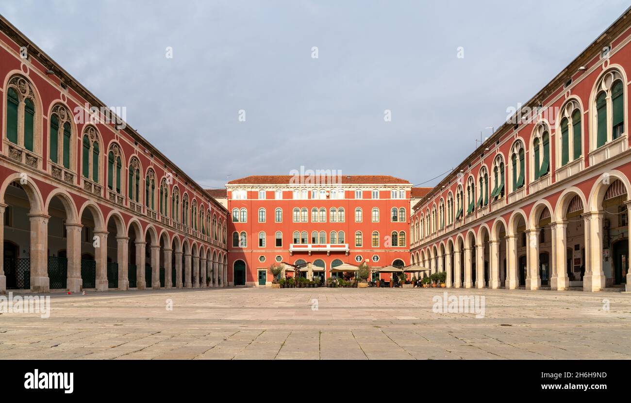 Split, Croatia - 12 November, 2021: view of the Republic Square and its neo-Renaissance buildings on three sides in the historic city center of Split Stock Photo