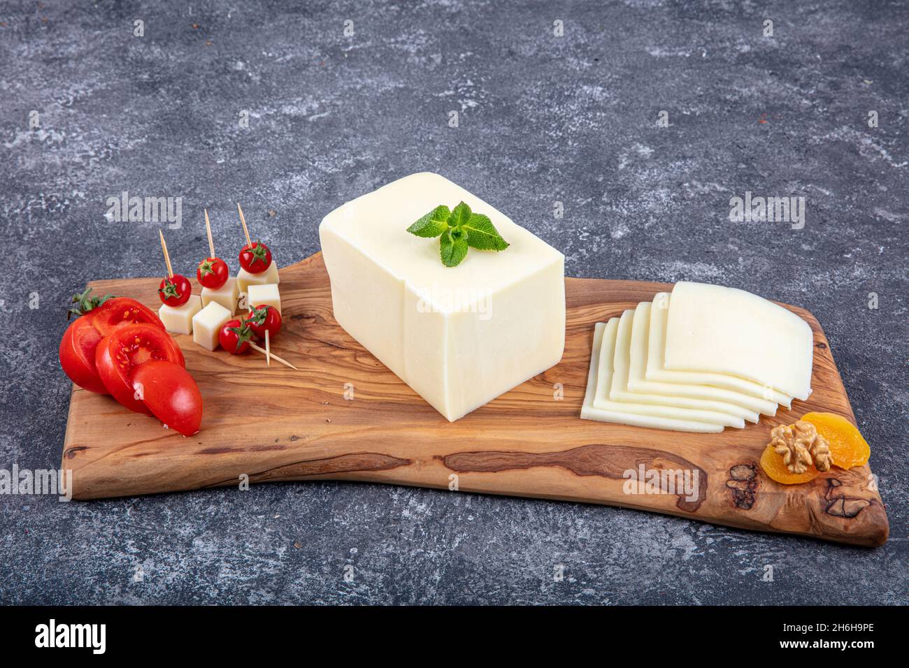 Kashar cheese or kashkaval cheese. Sliced Cheddar Cheese. gourmet cheese. local name taze kasar peyniri Stock Photo
