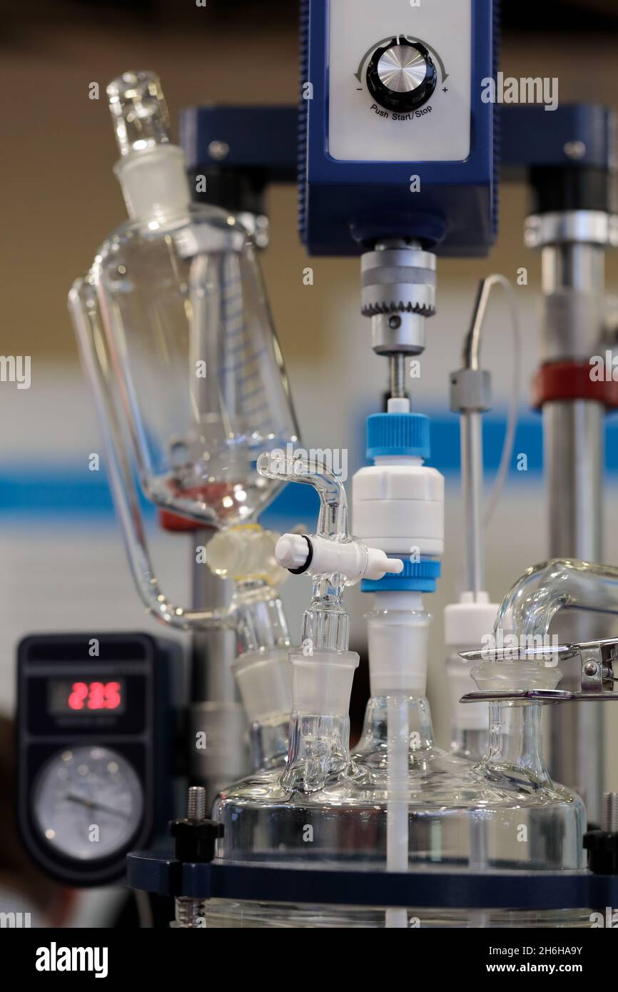 Laboratory glass chemical reactor with overhead stirrer. Selective