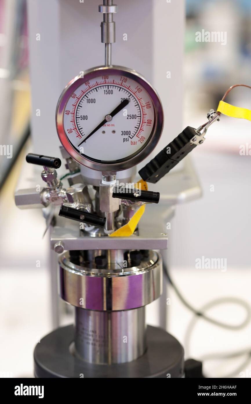 Manometer and high pressure processing equipment. Selective focus. Stock Photo