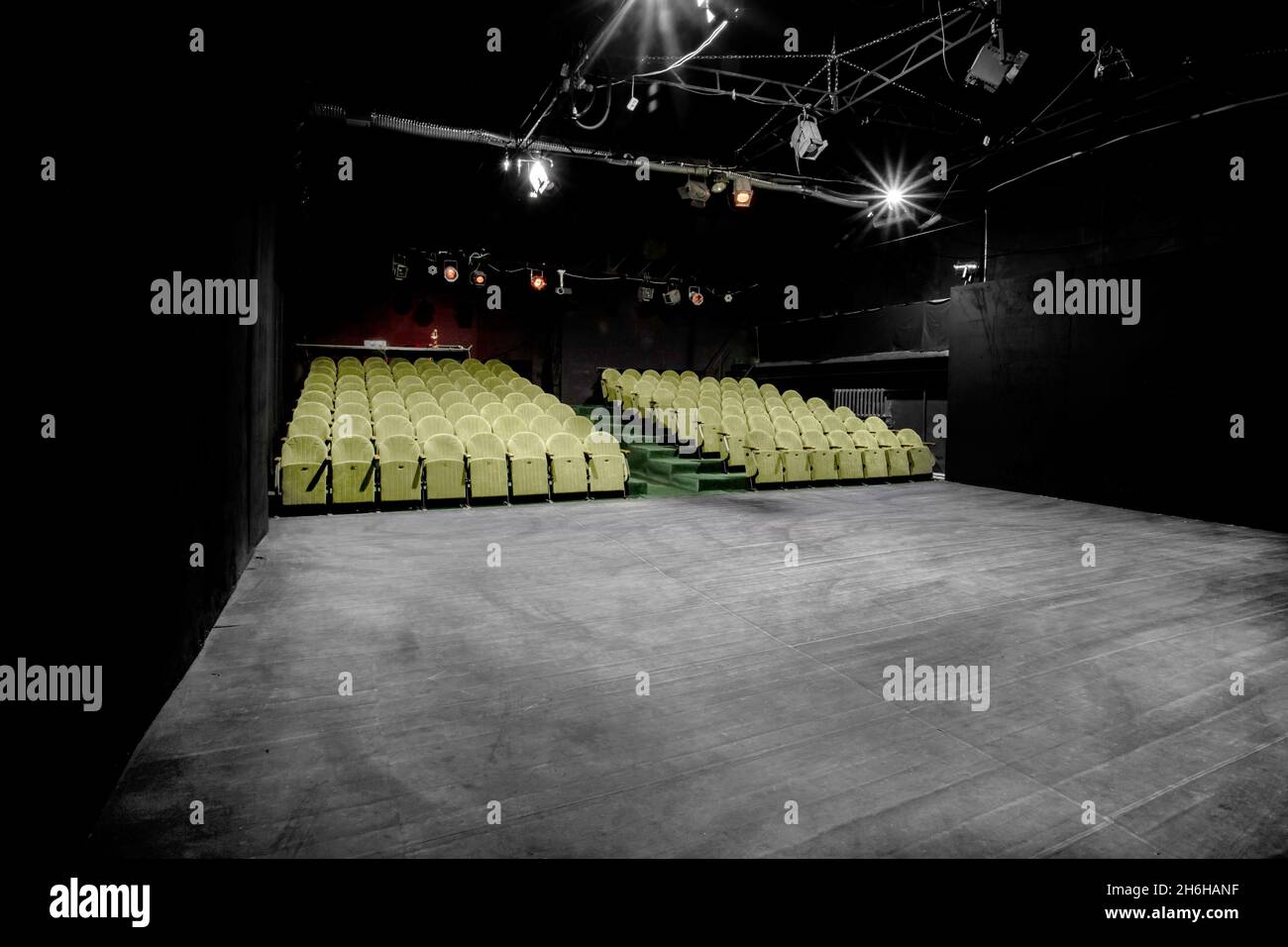 Image of a small auditorium with green armchairs Stock Photo