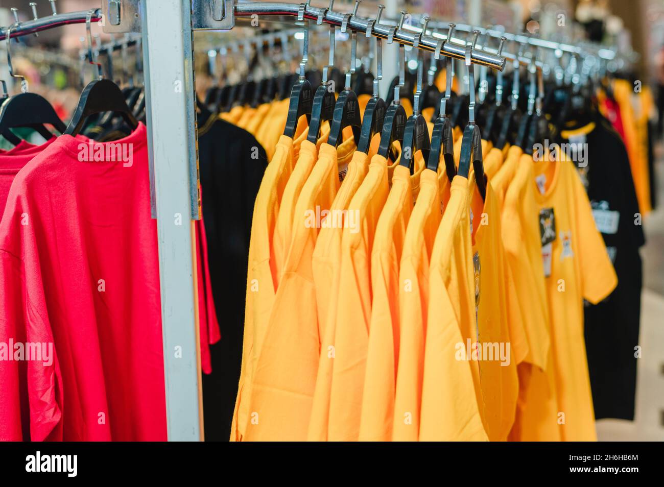 wooden-t-shirt-hangers-in-fashion-apparel-store-picjumbo-com – Elizabeth  Smith Knits
