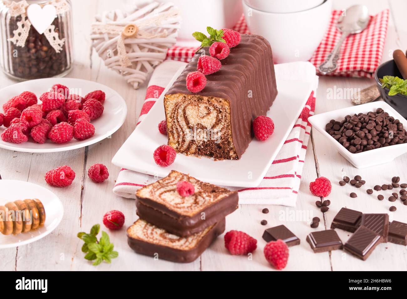 Marble cake with raspberries Stock Photo - Alamy