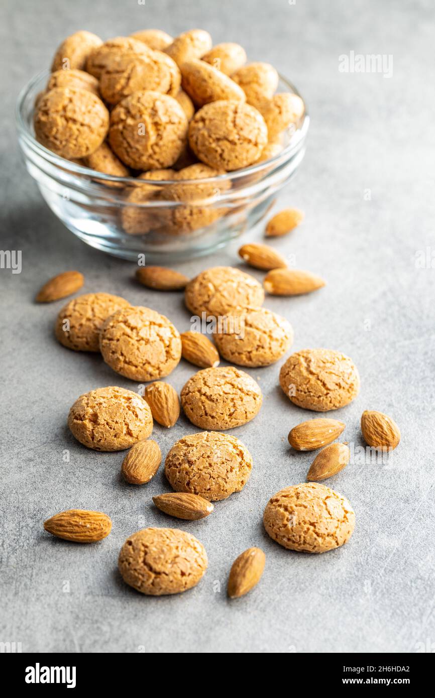 Amaretti biscuits. Sweet italian almond cookies on kitchen table Stock