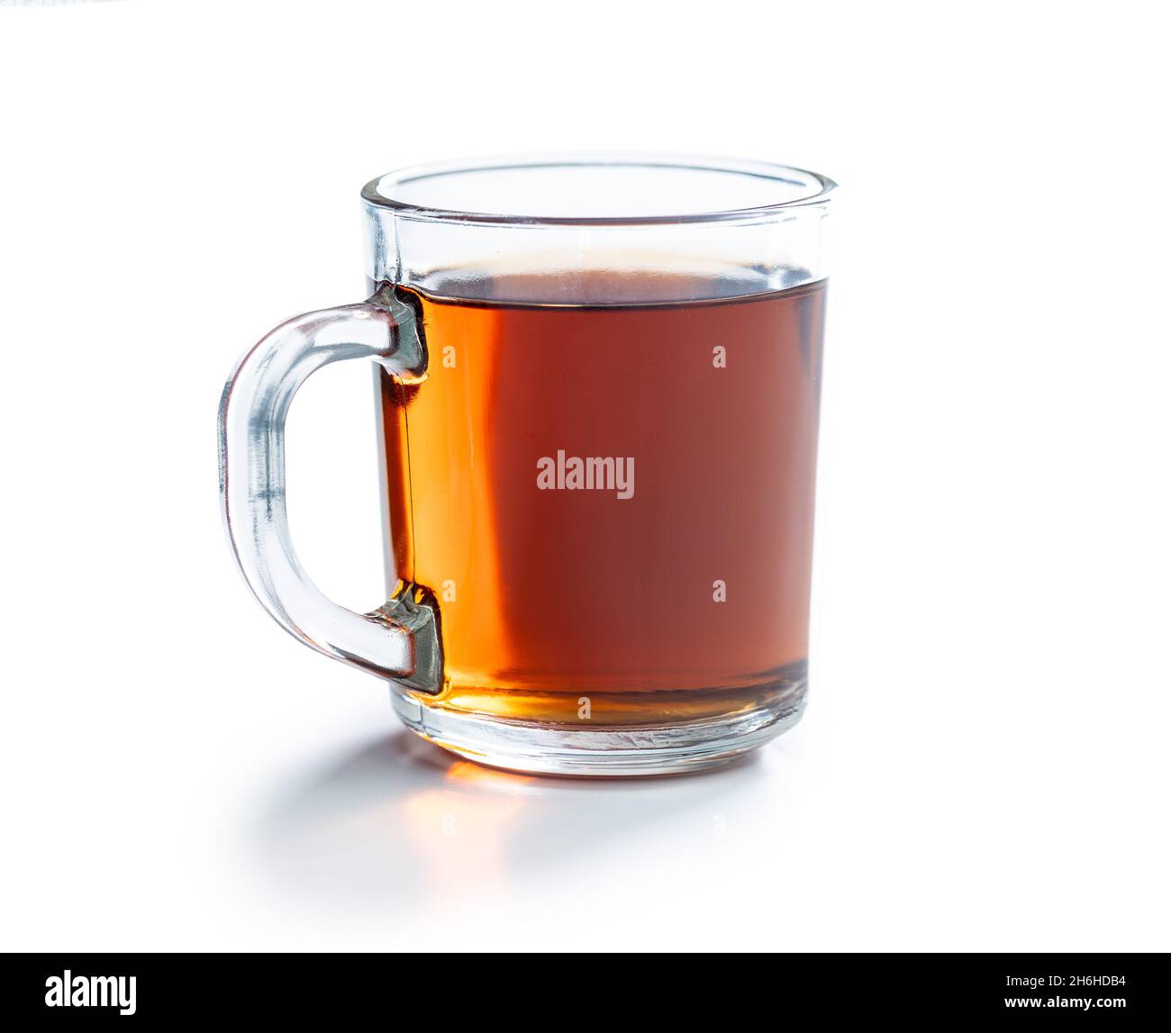 Tea in glass cup isolated on white background. Stock Photo