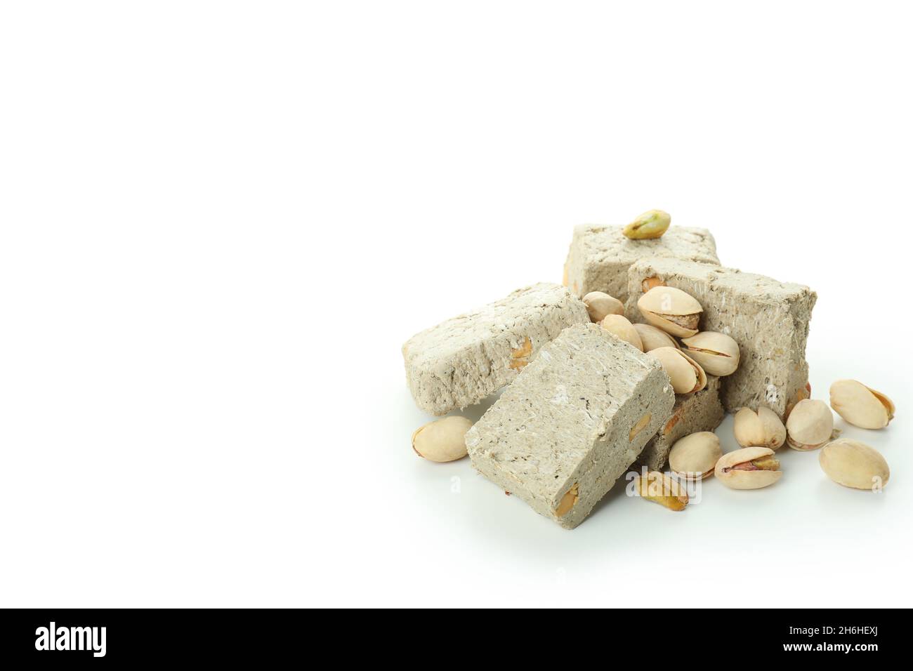 Halva with pistachio isolated on white background Stock Photo