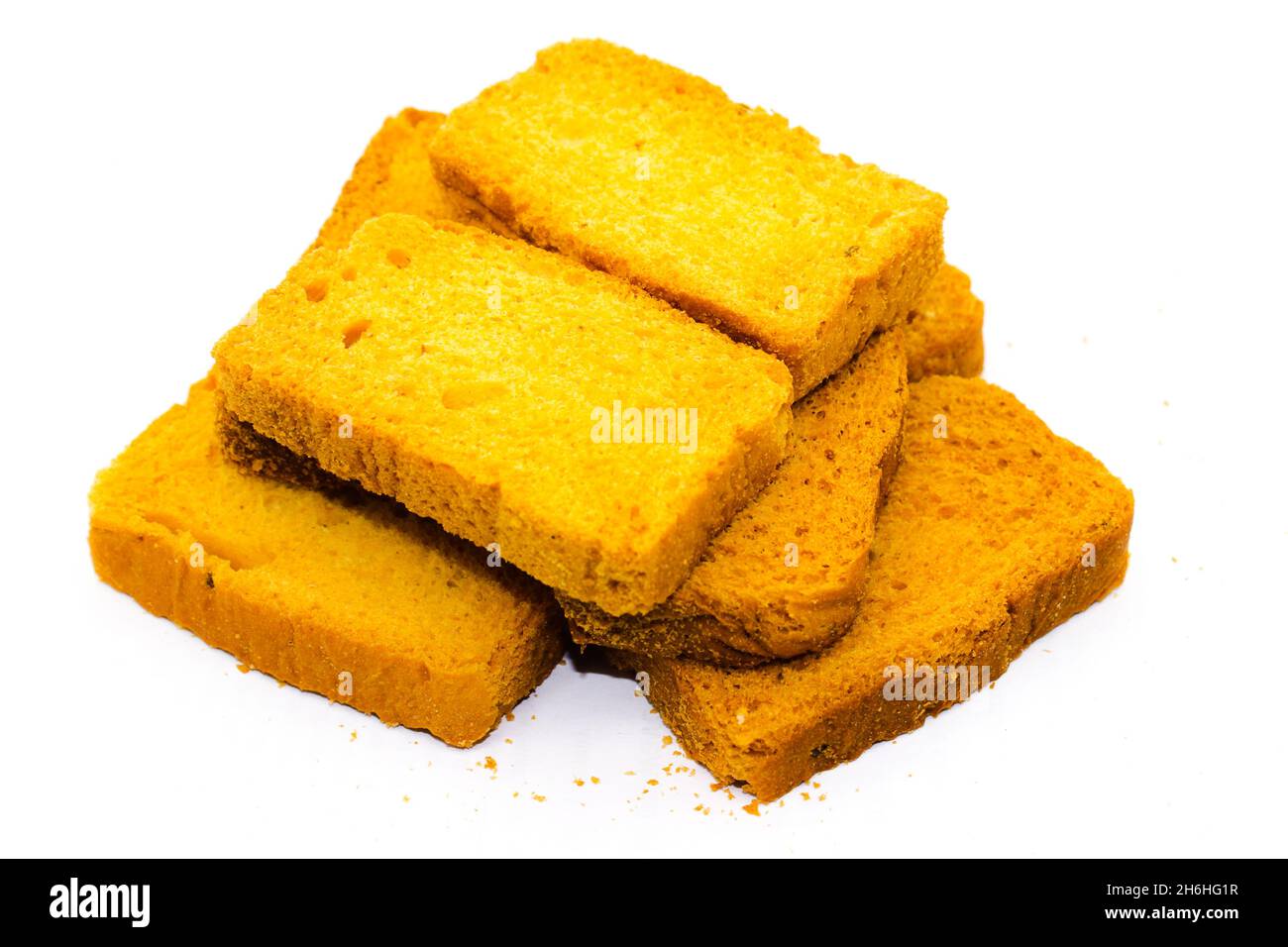Crispy rusk on white background with selective focus Stock Photo - Alamy