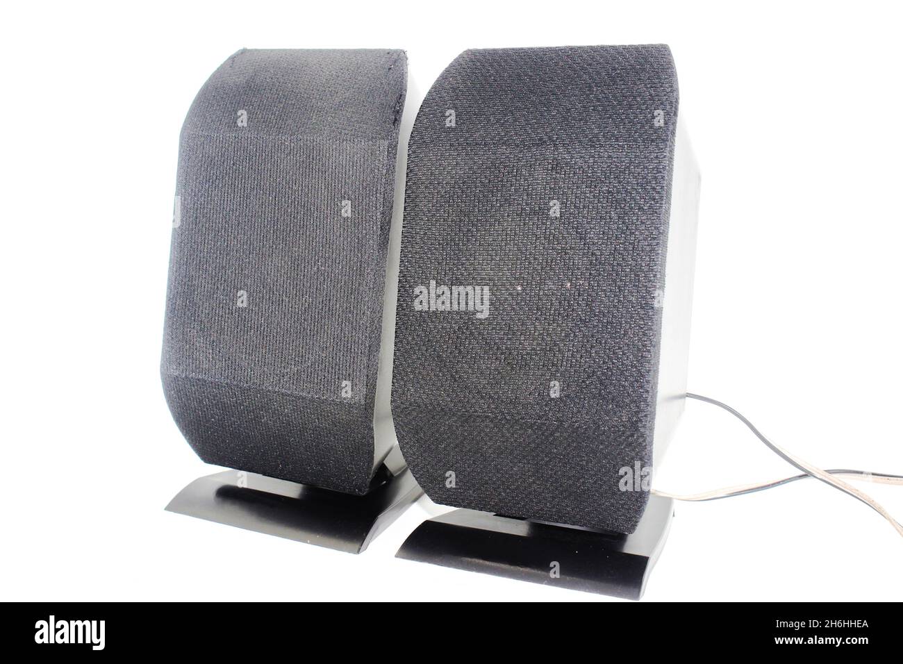 Two electric speakers on white background with selective focus Stock Photo
