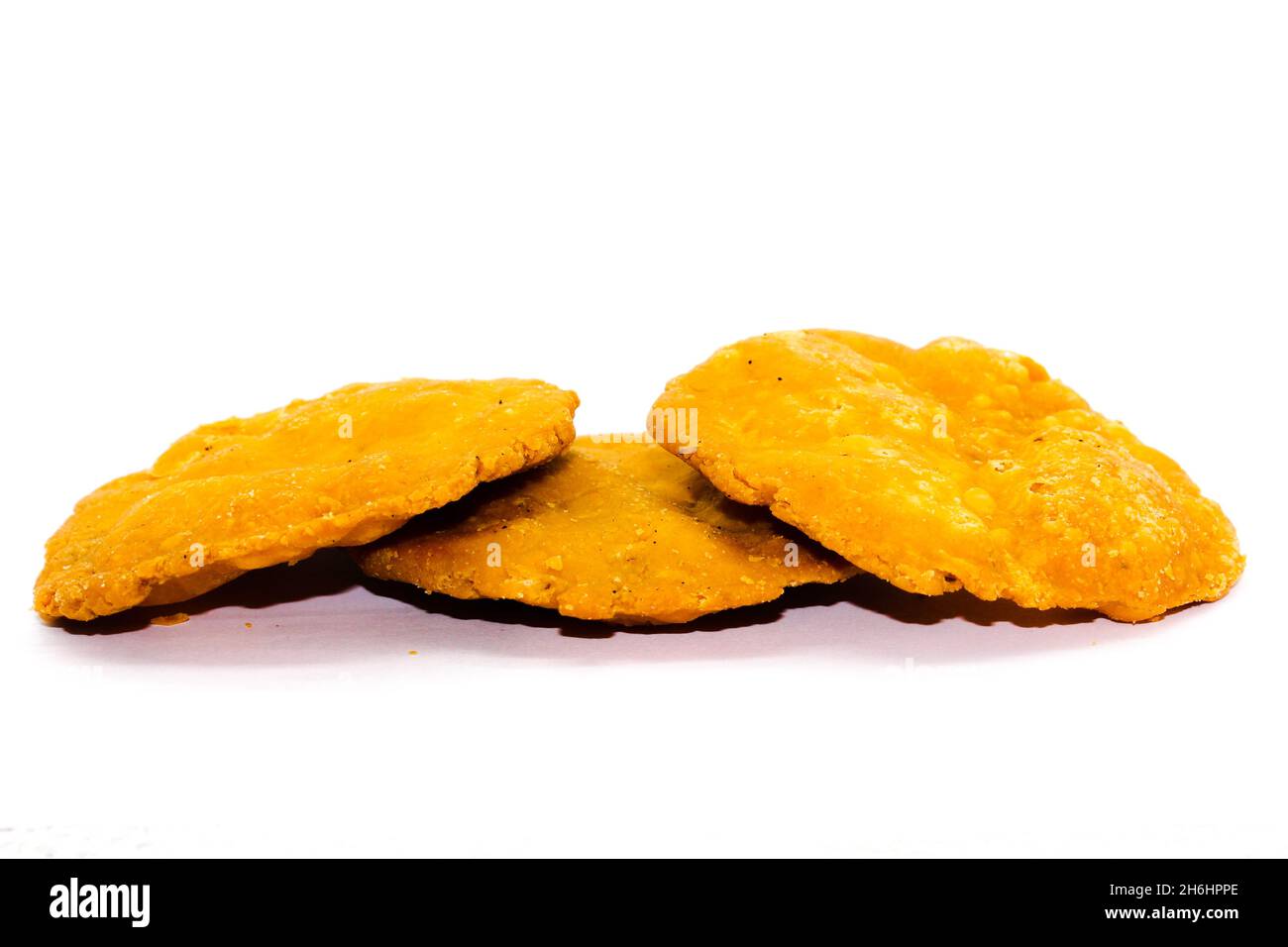 Mathdi Crispy and salty mathdi on white background with selective focus Stock ...