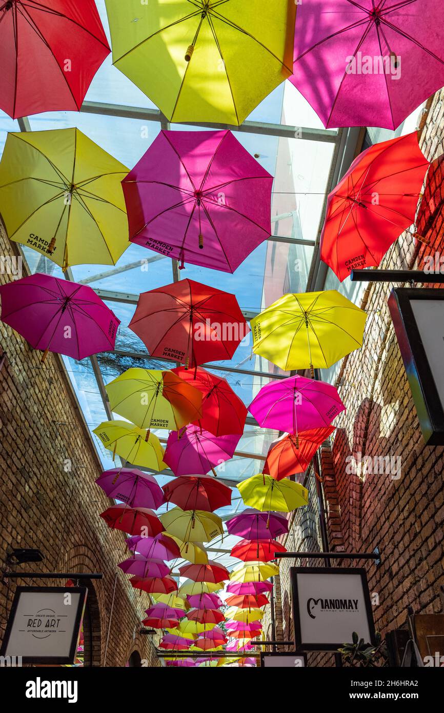 The colourful umbrella alley in Camden stables market, Camden Town, London. Stock Photo