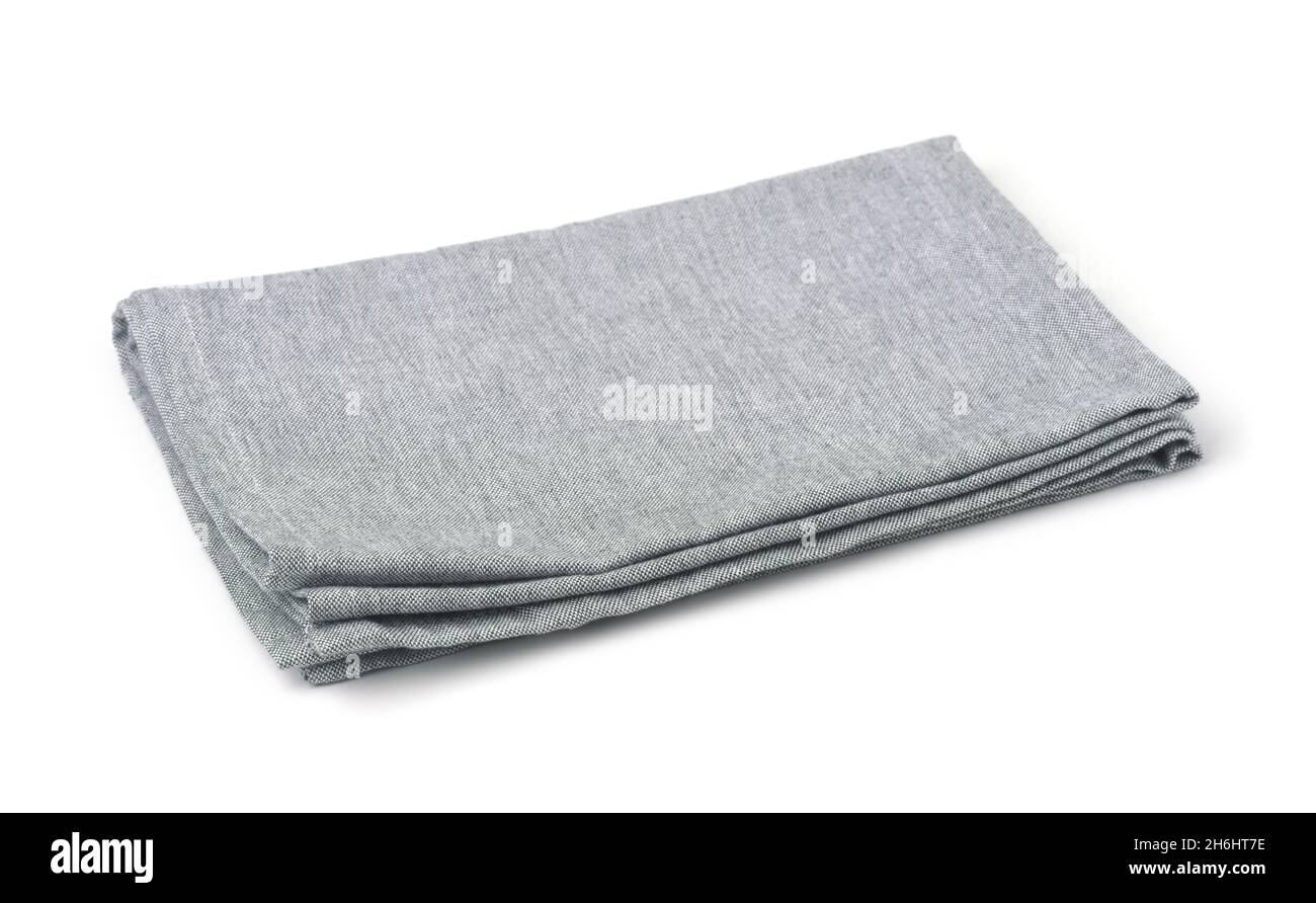 Folded grey cotton table napkin isolated on white Stock Photo
